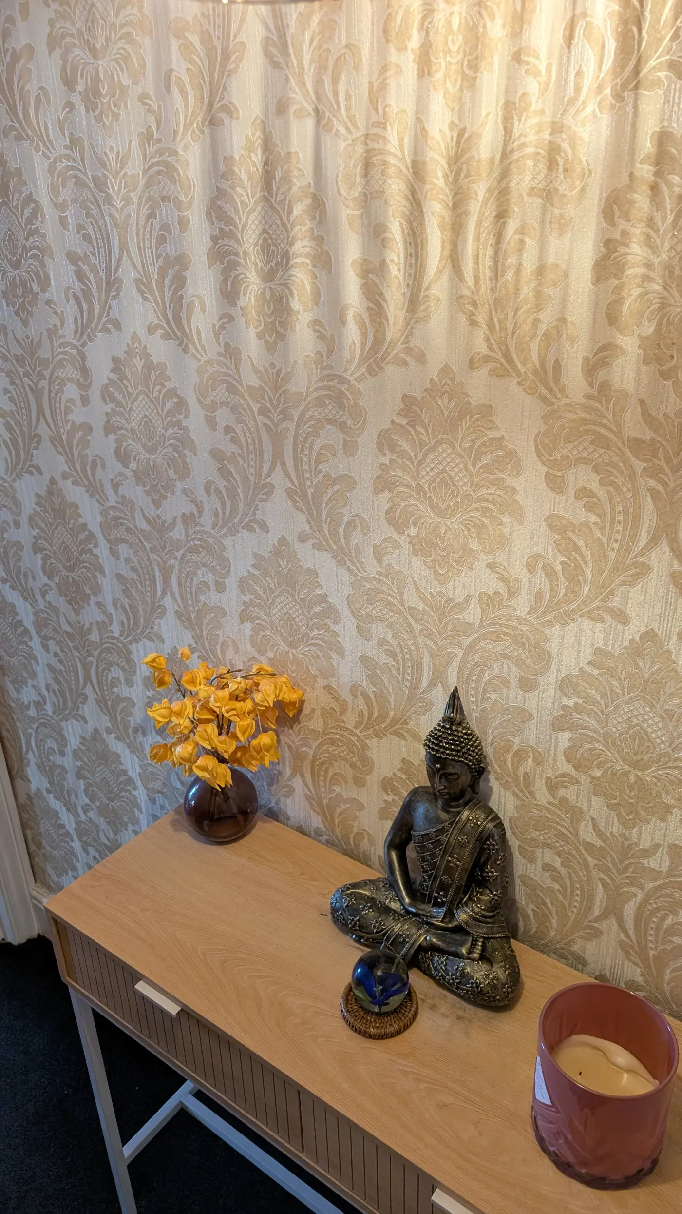 Lotus flowers and massage oil on a woven Thai cloth